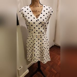 White and navy faux wrap style dress